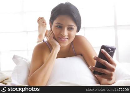 Girl looking at picture on mobile phone