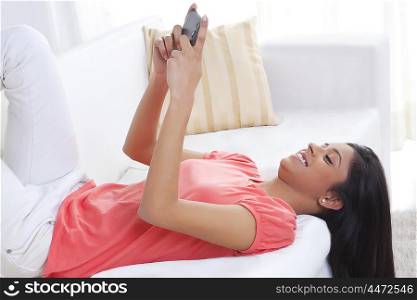 Girl looking at picture on mobile phone