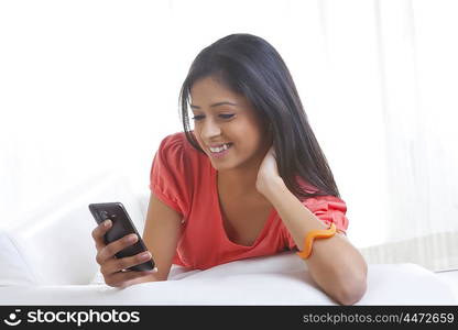 Girl looking at picture on mobile phone