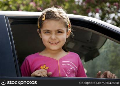 Girl looking out of the car window