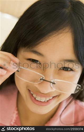 Girl Looking Through New Glasses