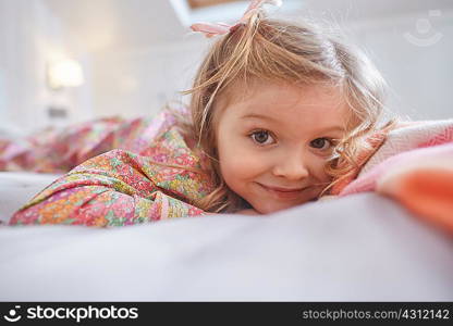 Girl lying on bed