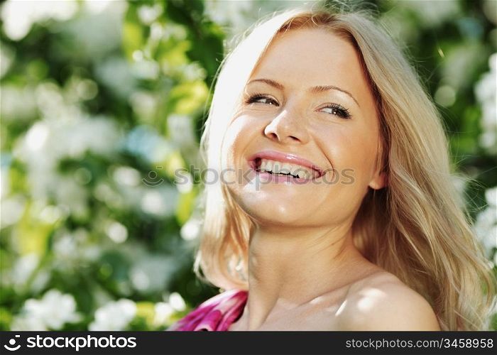 girl on a background of white flowers
