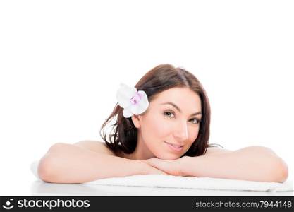girl on a bath towel posing on a white background