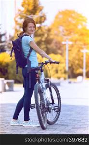 girl on a bicycle in the park