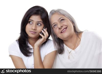 Girl on call while grandmother listening her conversation
