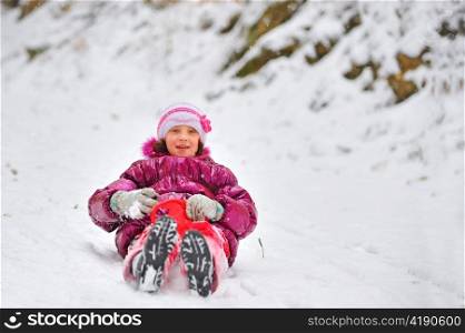 girl on sleigh