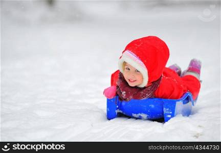 girl on sleigh