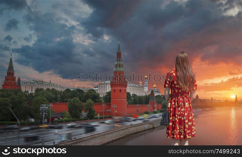girl on the background of the Kremlin in Moscow. Russia.