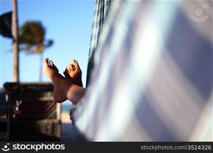 girl on vacation relax in hammock