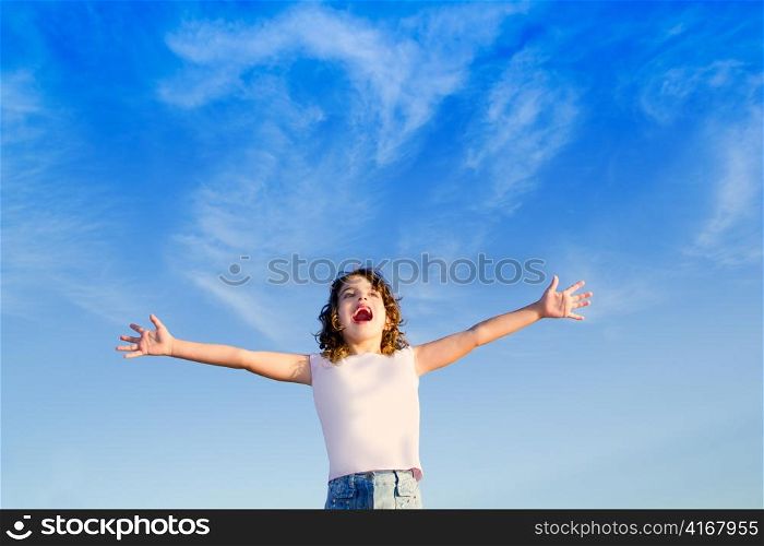 Girl open arms outdoor under blue sky with happiness gesture