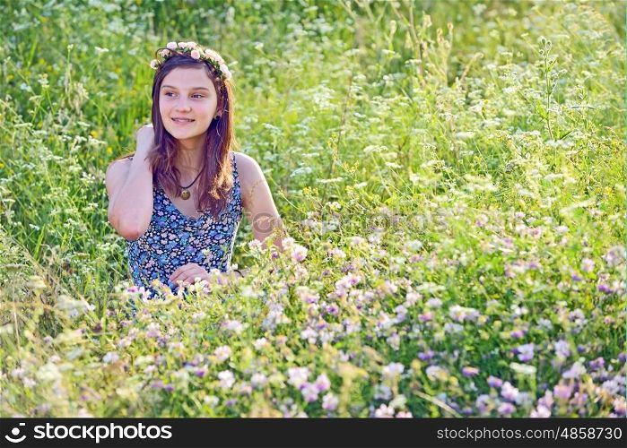 Girl Outdoors enjoying nature in summer time