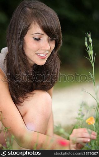 Girl picking flowers