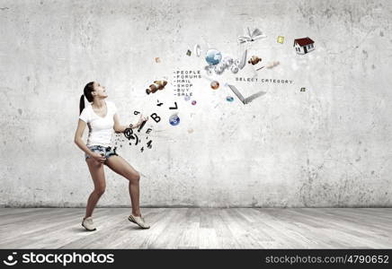 Girl play guitar. Young pretty girl in shorts and shirt playing imaginary guitar