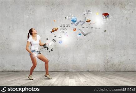 Girl play guitar. Young pretty girl in shorts and shirt playing imaginary guitar