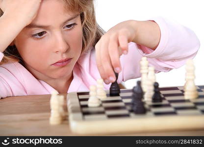 Girl playing chess