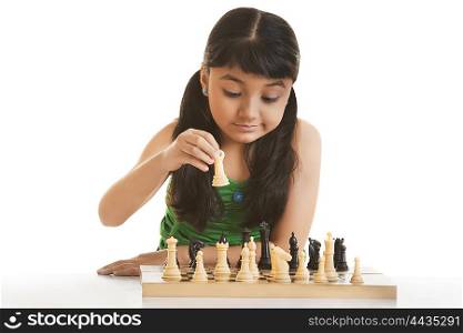 Girl playing chess