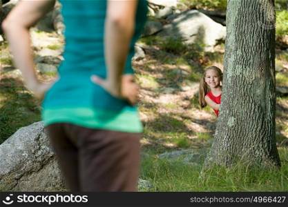 Girl playing hide and seek