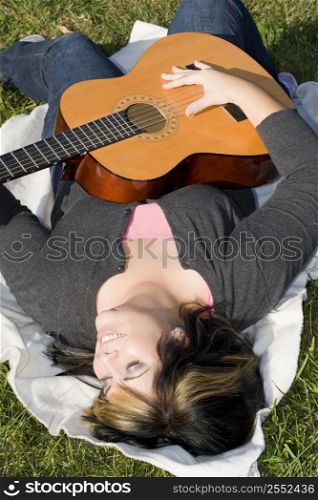Girl playing the guitar