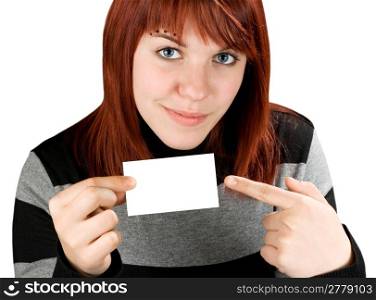 Girl pointing finger at a blank business card, smiling and cute. Studio shot.