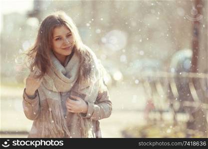girl portrait by the first snow