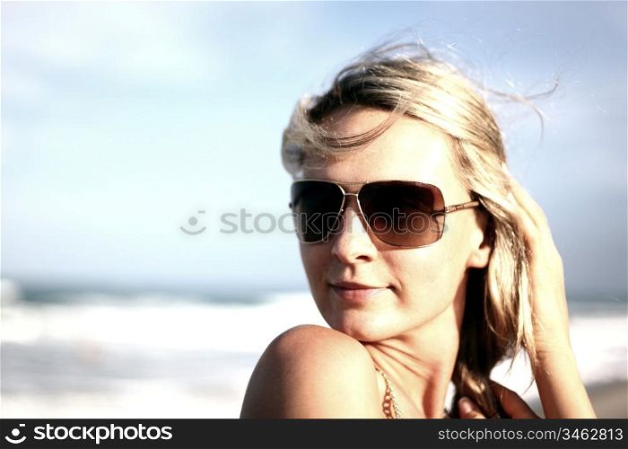 girl portrait close up ocean on background