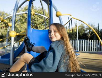 girl posing slide outdoors