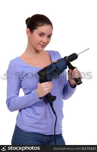 girl posing with drill