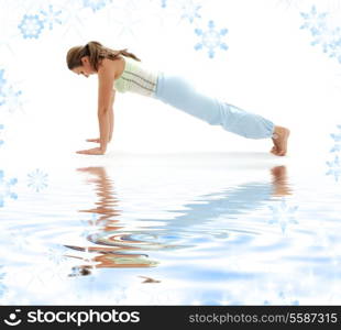 girl practicing chaturanga dandasana four-limbed staff pose