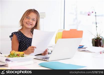 Girl Pretending To Be Businesswoman Working At Desk