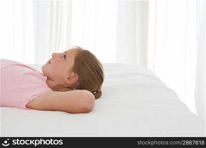 Girl Relaxing on Bed