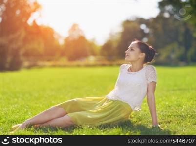 Girl relaxing on meadow