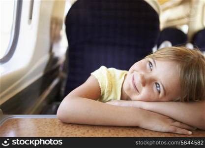 Girl Relaxing On Train Journey
