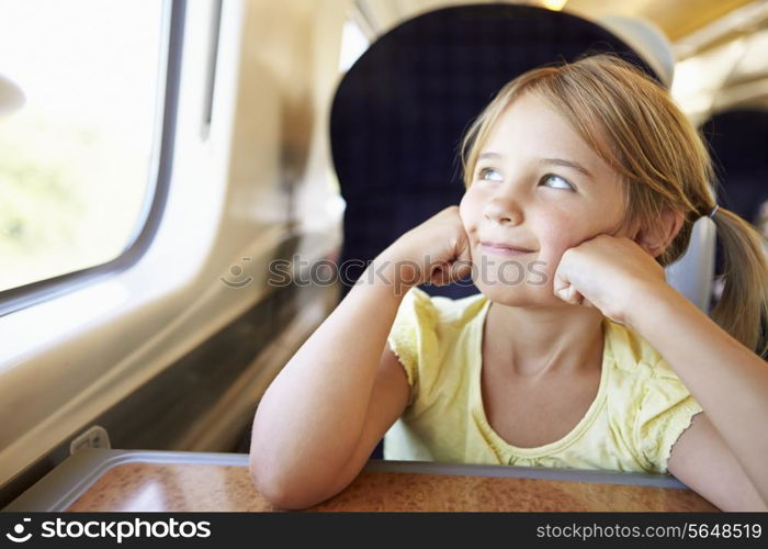 Girl Relaxing On Train Journey