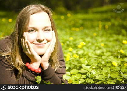 Girl Resting In Meadow. Spring Season.