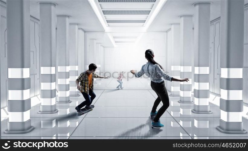 Girl ride skateboard. Active girl riding skateboard in virtual futuristic interior. Mixed media