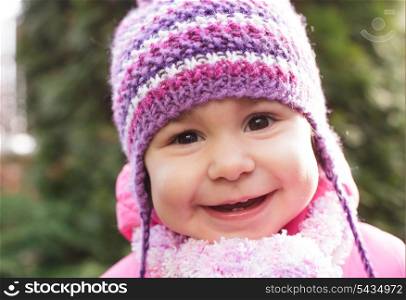 Girl&rsquo;s face with cute smile closeup, outdoors