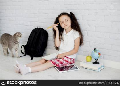 girl scratching head with eyes closed