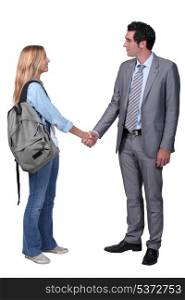 girl shaking hand with man