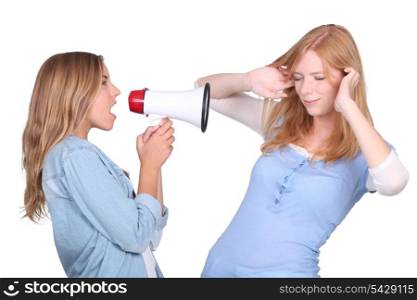 girl shouting through a megaphone