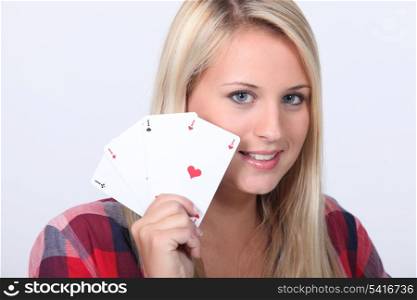 Girl showing cards