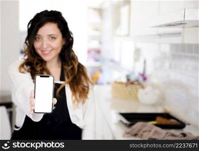 girl showing mobile phone