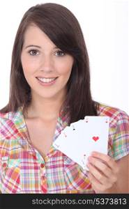 Girl showing playing cards