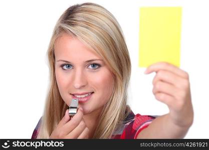 Girl showing the yellow card