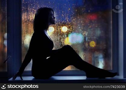 girl silhouette window