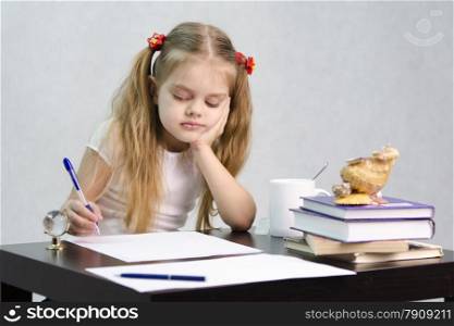 girl sits at a table and wrote on a sheet of paper. There are tombs of books, sheets of paper, a pen, glass globe, with a glass of tea, sea shell. The image of the writer
