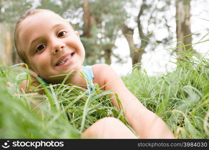 Girl sitting in grass