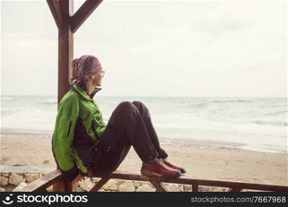 girl sitting on a beach