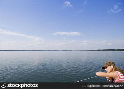 Girl sitting on boat