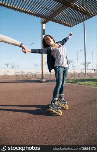 Girl skating and enjoying a spring afternoon